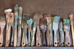 Rustic paint brushes and artist s palette on Sale