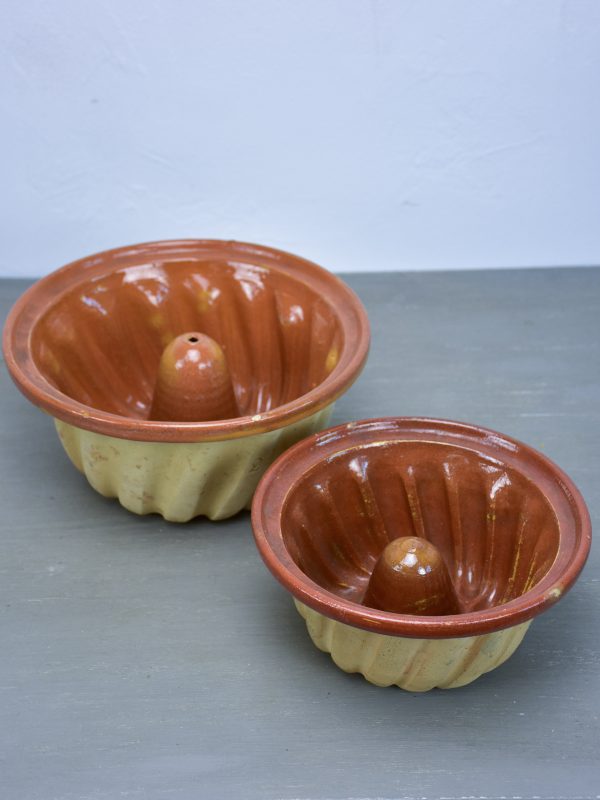 Two antique French terracotta Gugelhupf cake moulds Supply